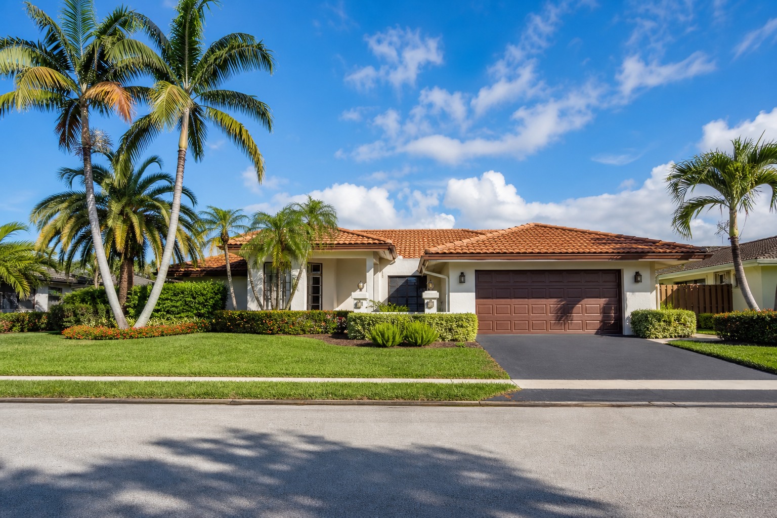 davie florida flood insurance cost by zone 2026 1 A single family home in Davie Florida with a well maintained lawn and palm trees on a bright 2026 day, the kind of inland suburban property a buyer would price flood insurance for