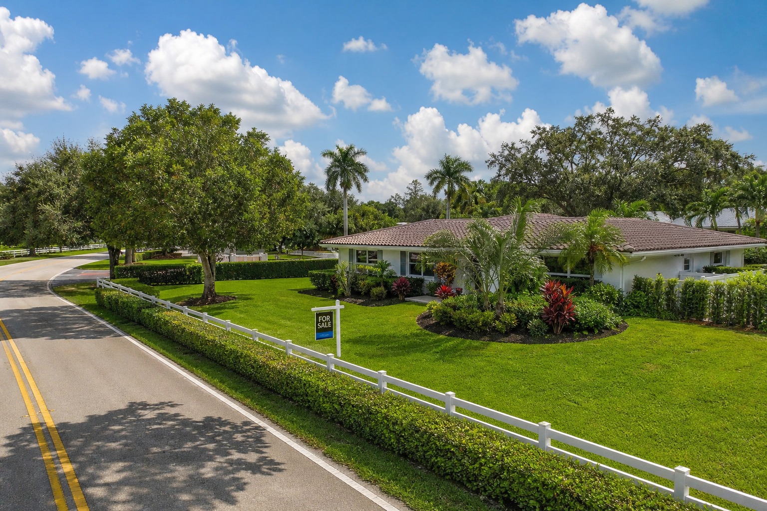 davie florida financing contingency A single family home in Davie Florida with a for sale sign and paver driveway under a bright sky, representing a home under contract