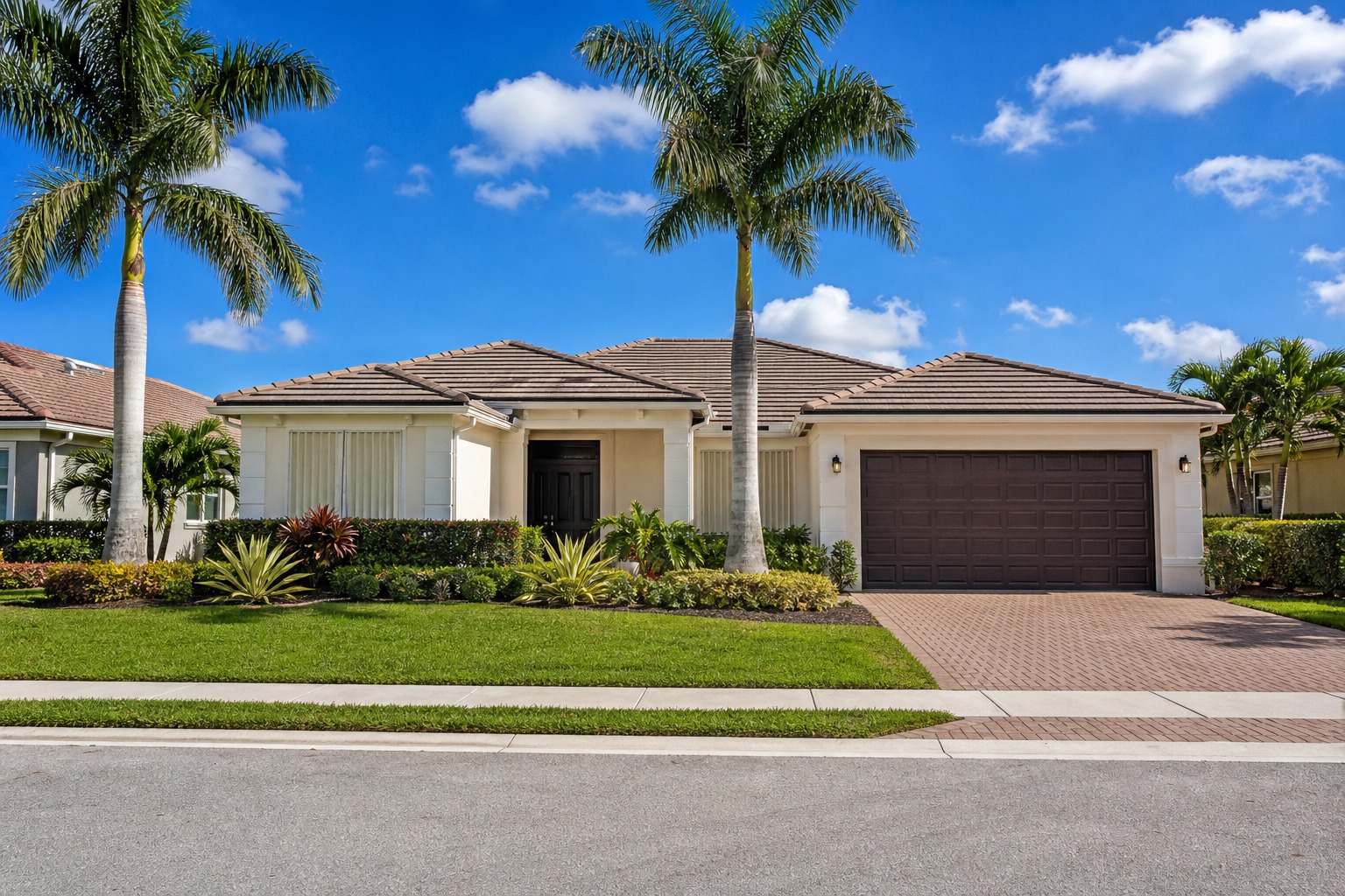 davie florida hurricane deductible 2026 single family 1 Single family home with hurricane shutters and impact windows on a landscaped lot in Davie Florida under a bright sky