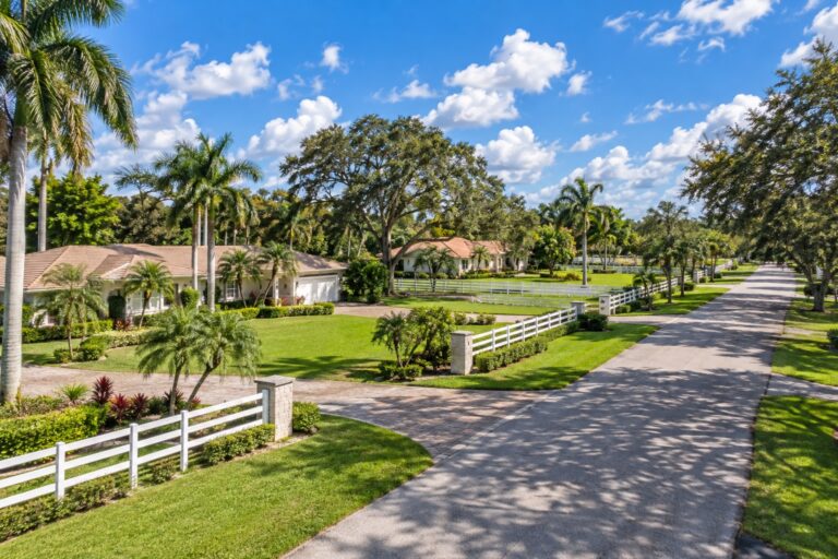Davie Florida single family ranch home with white fencing relevant to removing PMI and building home equity 2026